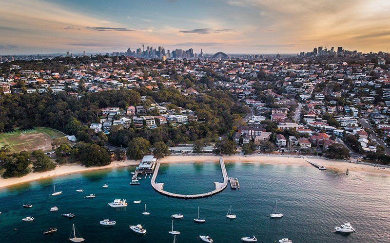 Aerial photograph of Sydney from Balmoral Bay facing toward the CBD