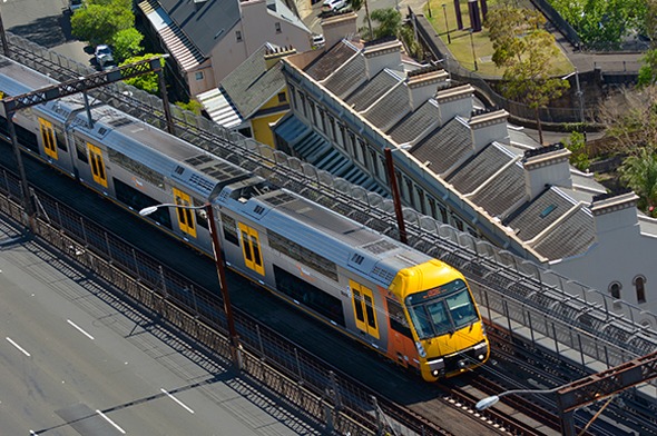 Aerial view of a Sydney train on a sunny day